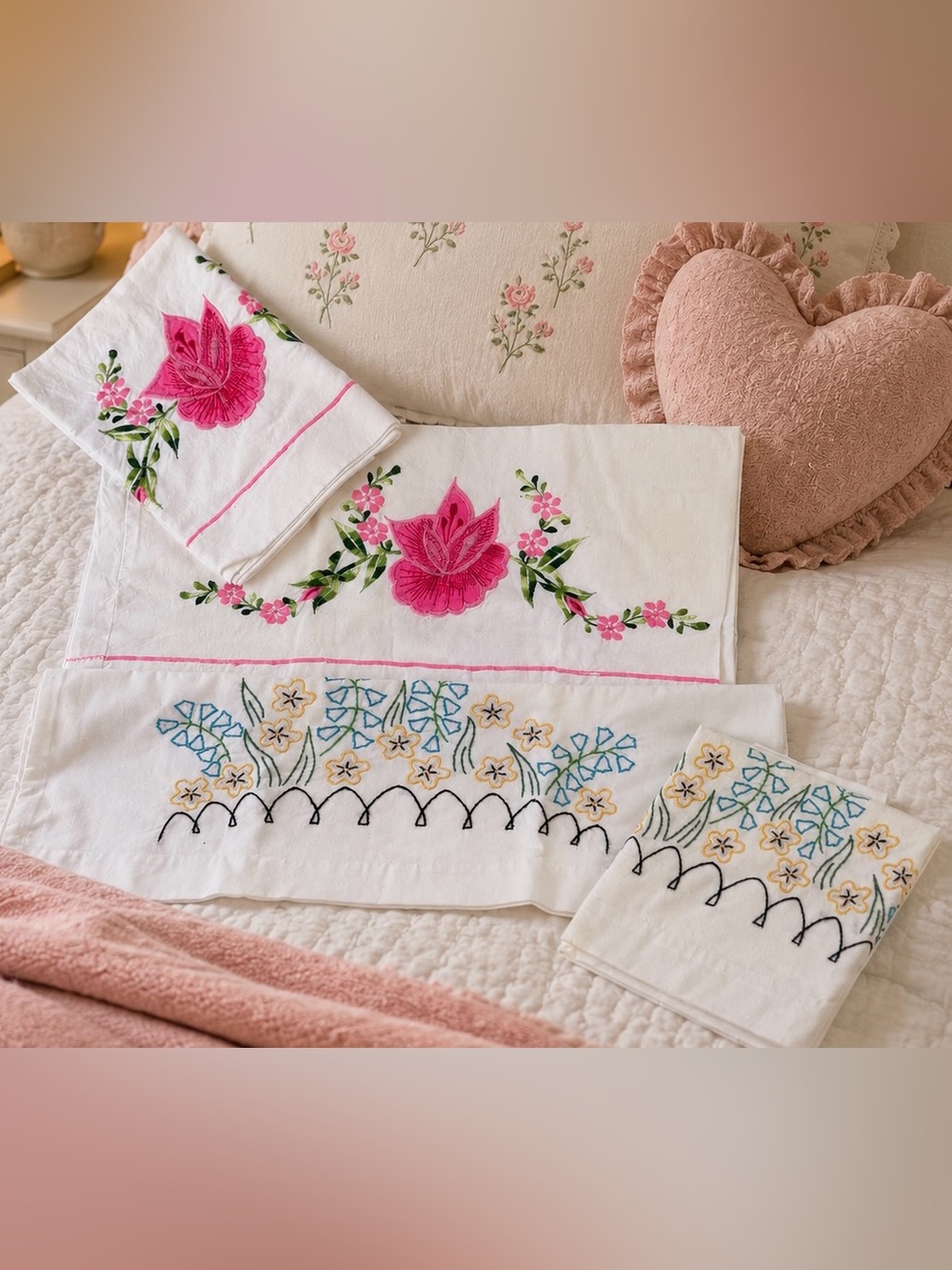 2 sets of Embroidered Floral Pillowcases. Needs proper cleaning